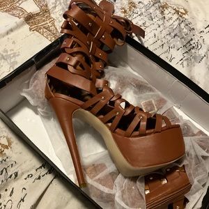 6” platform “Princess Leigh’s” knee high Sandle boots.